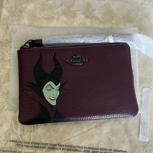 Disney maleficent wristlet coach